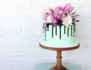 Love this chocolate drip cake with fresh magnolia flowers | 10 Amazing Drip Cakes - Tinyme Blog