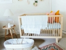 Adorable nursery with modern wood crib | 10 Aztec Kids Rooms - Tinyme Blog