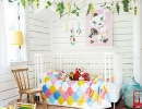 Love the bright color accents and garland of felt leaves | 10 Colourful Nurseries - Tinyme Blog