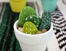 Colorful hand painted mini cactus | 10 Cute Cactus Projects - Tinyme Blog