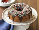 Big chocolate-glazed donut cake! | 10 Delicious Donut Cakes - Tinyme Blog