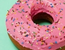 Enjoy this delicious pink frosted sprinkled donut | 10 Delicious Donut Cakes - Tinyme Blog