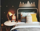 Dark bedroom with splashes of primary colours | 10 Dramatically Dark Kids Rooms - Tinyme Blog