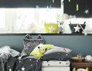 Hanging stars like jewels soften the whole look | 10 Dramatically Dark Kids Rooms - Tinyme Blog