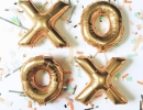 Glitzy metallic gold balloons | 10 New Years Party Ideas - Tinyme Blog