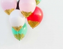Festive DIY confetti dipped balloons | 10 New Years Party Ideas - Tinyme Blog