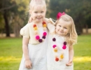 1. Handmade colorful mini pom pom necklace by 99RedBalloonsShop