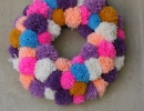 8. Colorful DIY pom pom rug by Design Rulz