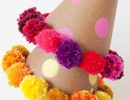 9. Soo cute DIY pom pom party hat by Tell Love and Party