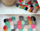 Pom Pom rug | 10 Pom Pom Crafts - Tinyme Blog