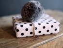 Pretty pompoms | 10 Quirky Christmas Wrappings - Tinyme Blog