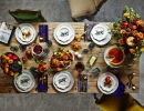 Festive table using printed plates and cobalt blue napkins | 10 Thanksgiving Table Settings - Tinyme Blog